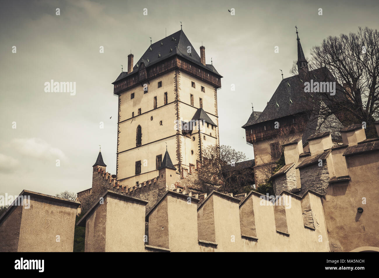Karlstejn castle exterior. Gothic castle founded 1348 CE by Charles IV, Holy Roman Emperor-elect and King of Bohemia. Karlstejn village, Czech Republi Stock Photo