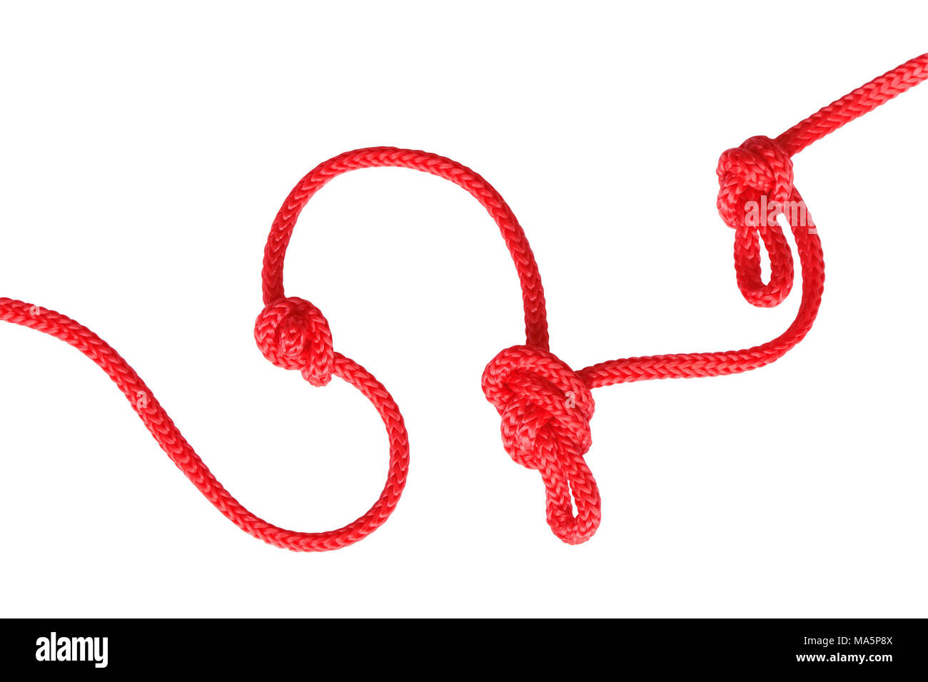Closeup of red rope with knots isolated on white background with