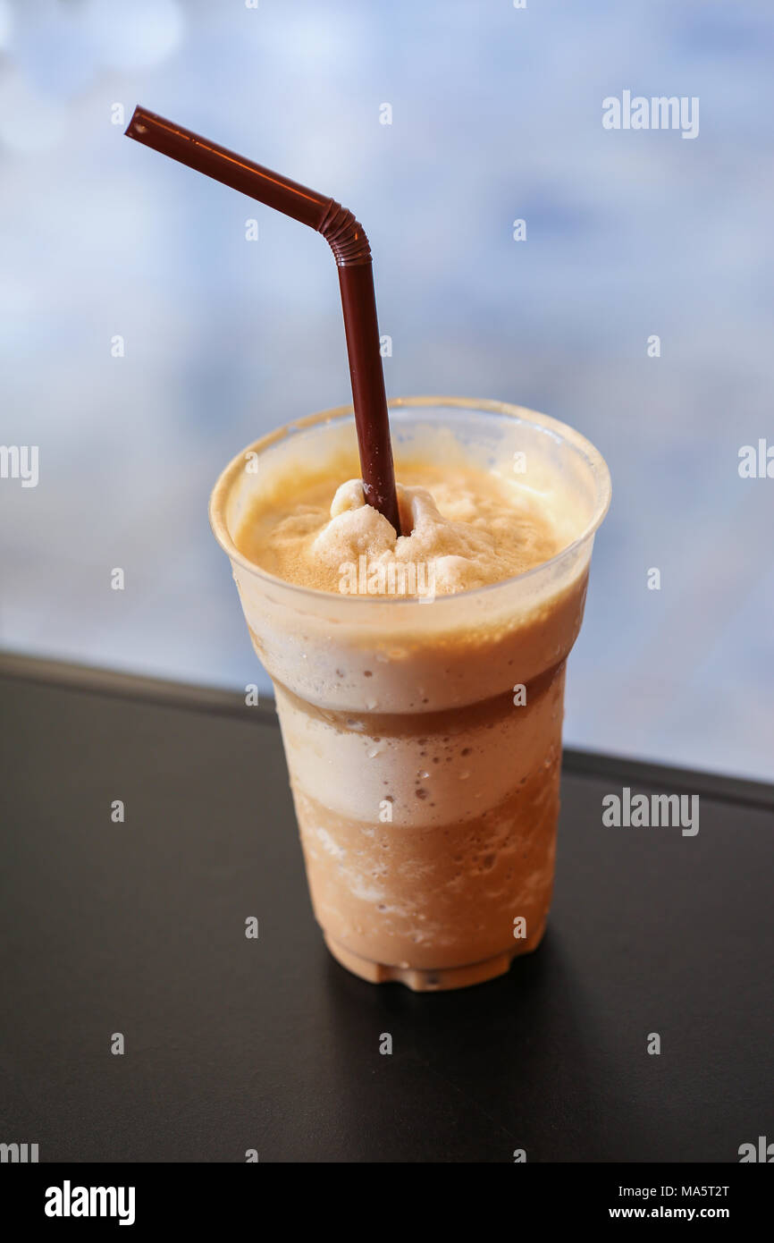 Iced coffee smoothie on black table Stock Photo