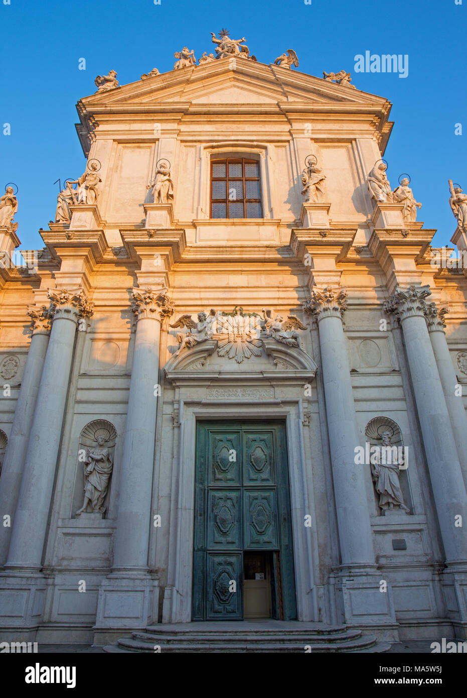 VENICE, ITALY - MARCH 13, 2014: Church Chiesa dei Gesuiti (Santa Maria Assunta) in sunset light. Stock Photo