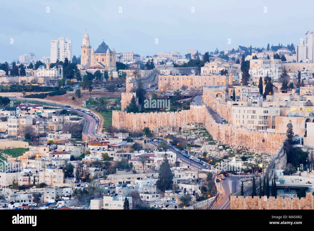 Jerusalem - Outlook from Mount of Olives to Dormition abbey and south part of town walls in morning dusk. Stock Photo