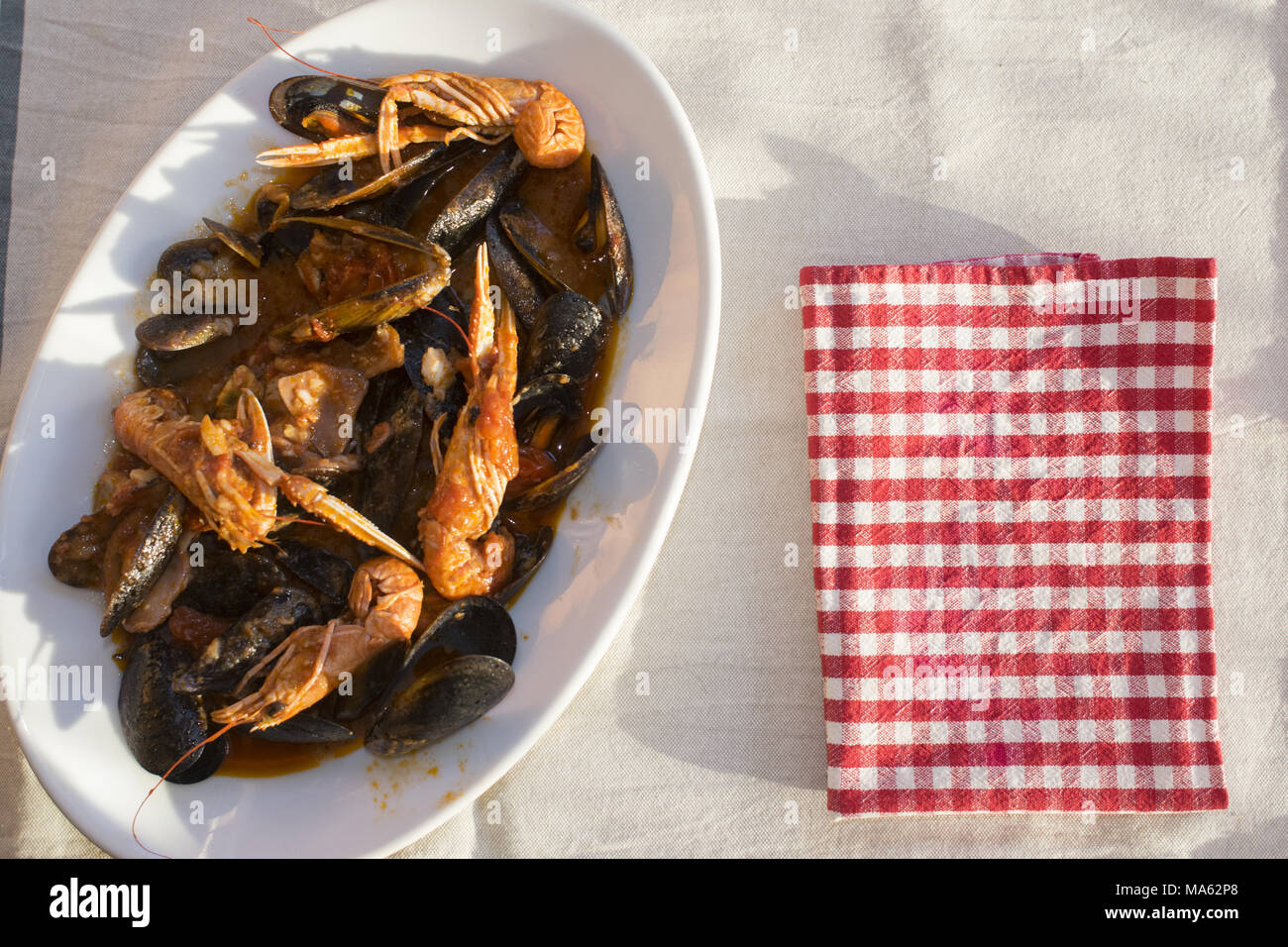 seafood sauce with mixed fish to season linguine pasta Stock Photo Alamy
