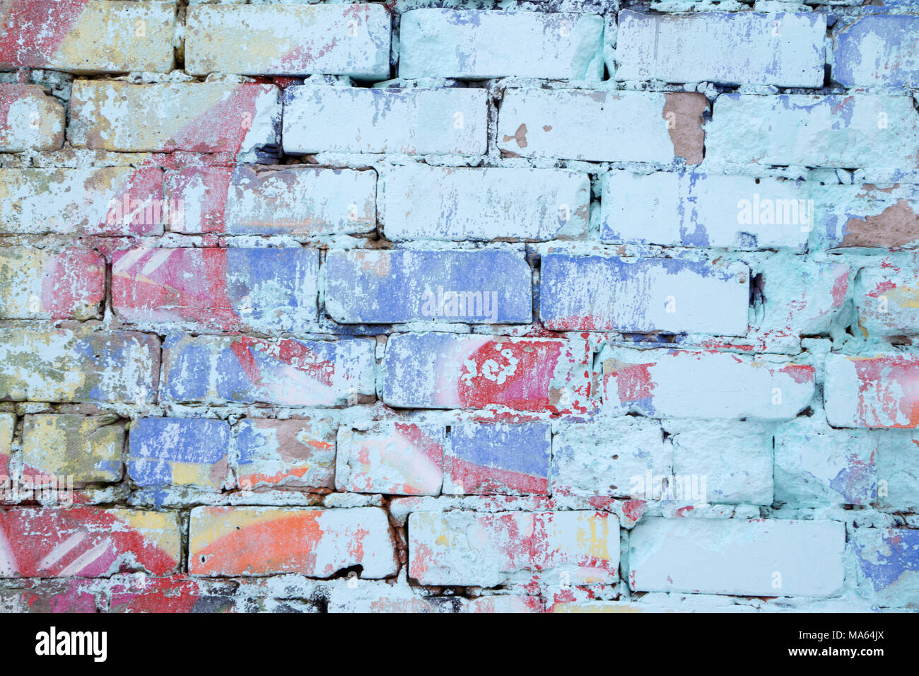 grunge wall painted in rainbow colors Stock Photo