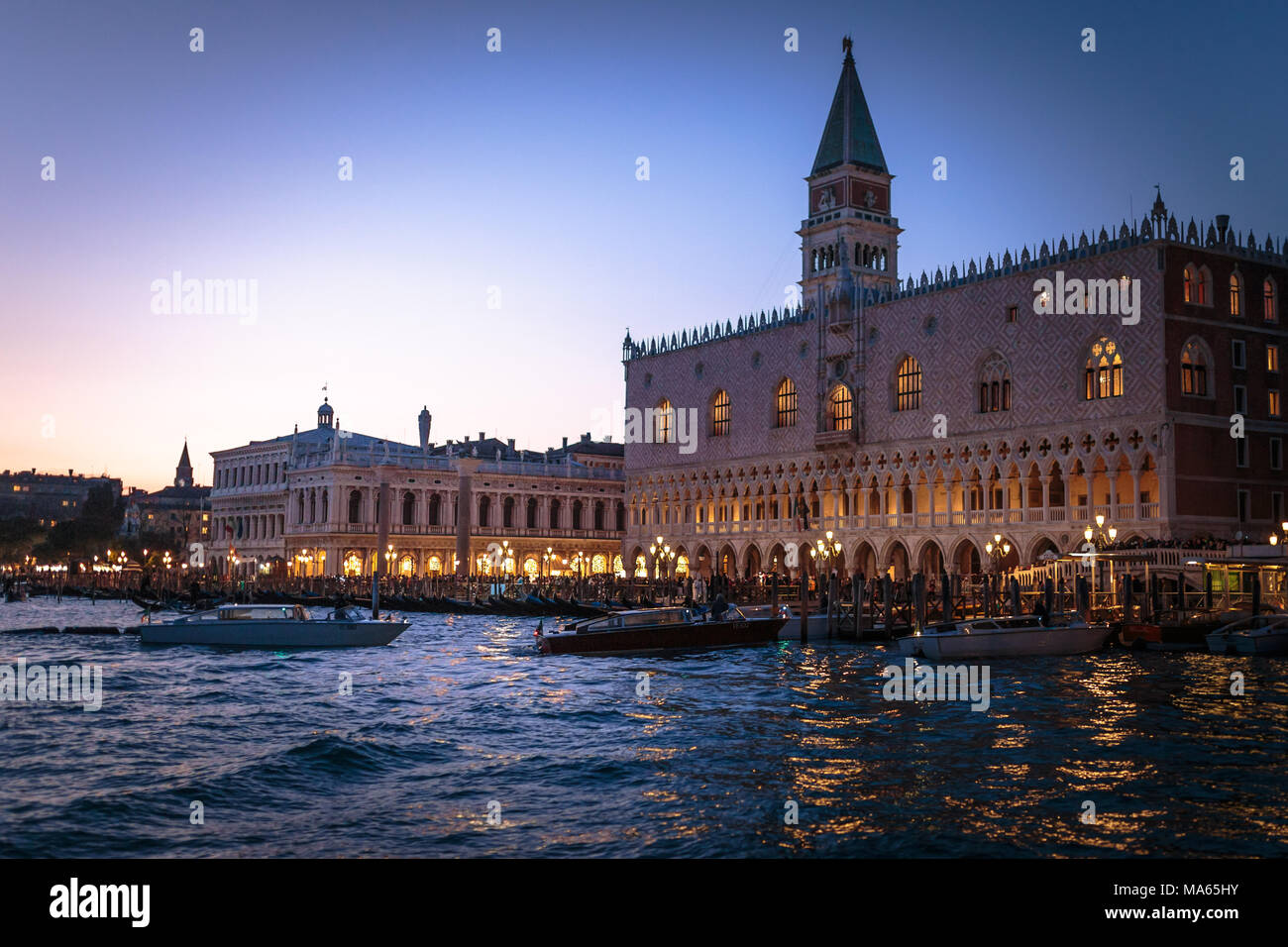 Venice (Italy) - Ducal Palace and San Marco Square seen from Venice Lagoon at night Stock Photo