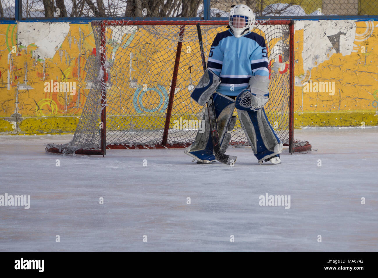 ice hockey goalie in goal face blurred Stock Photo Alamy