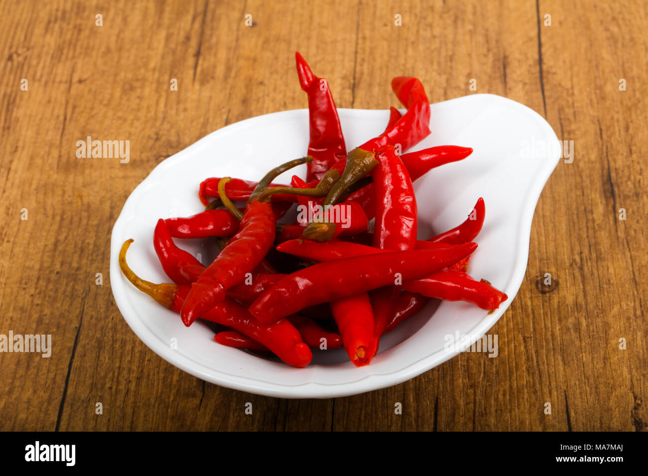 Pickled chili peppers Stock Photo - Alamy