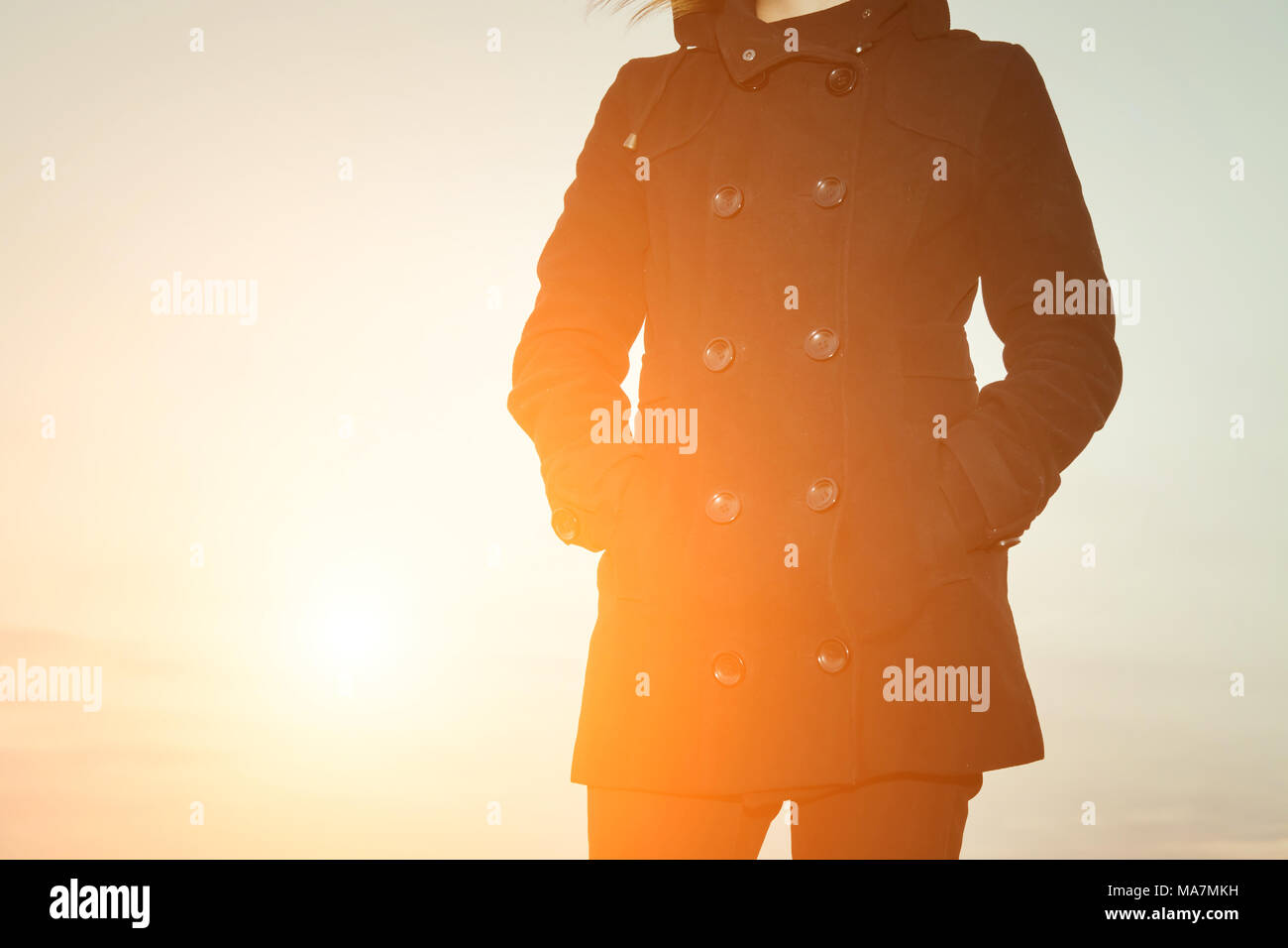 Young woman in the black coat Stock Photo - Alamy