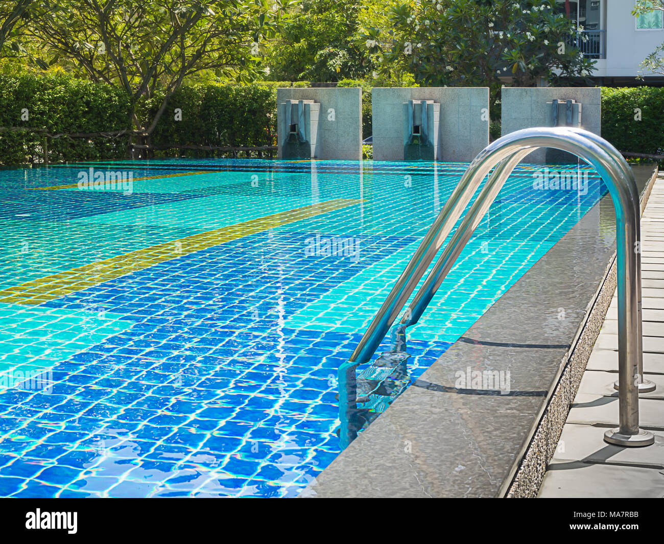 Swimming Pool in Condominium on Sunny Day Stock Photo - Alamy