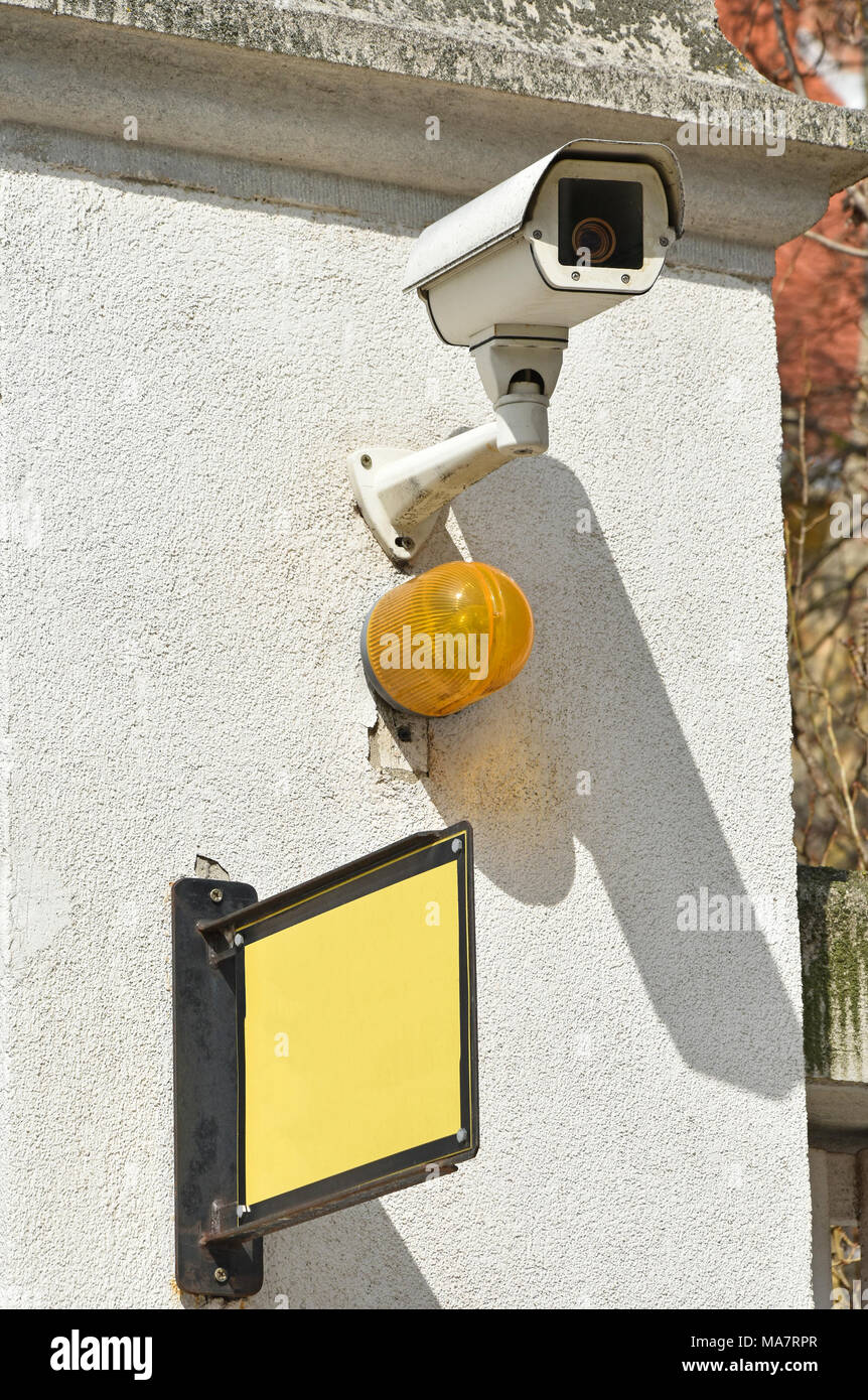 Security system on the wall Stock Photo - Alamy