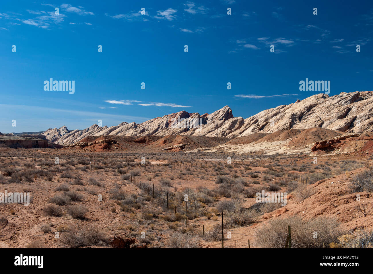The San Rafael Reef, at the eastern edge of the San Rafael Swell, as seen from Interstate 70 near the town of Green River, Utah. Stock Photo