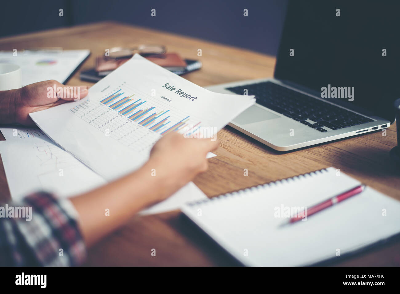 young  Businessman woman hands reviewing analyzing financial data chart. Stock Photo