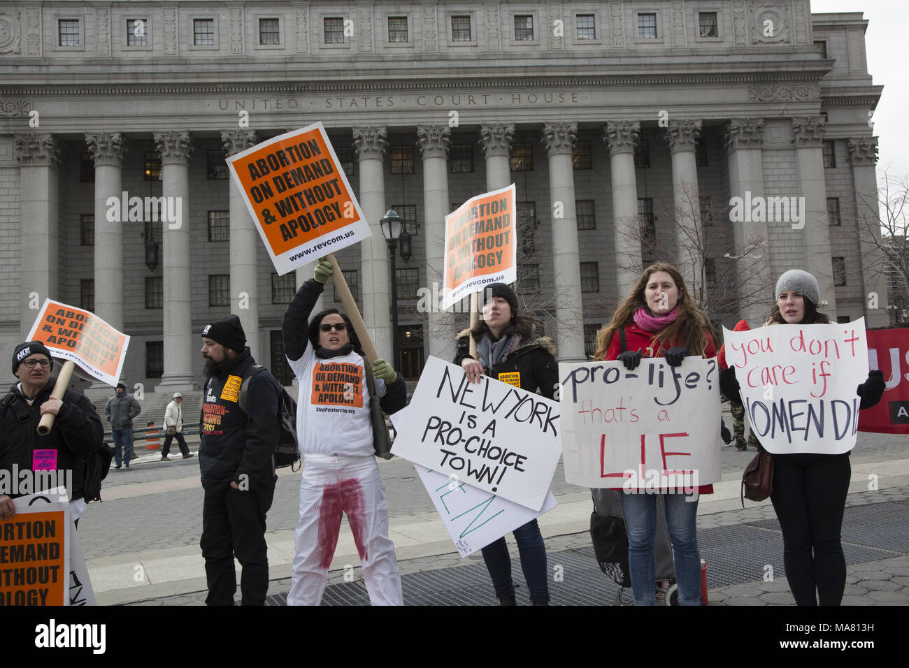 International Gift Of Life annual rally and walk of  Pro-Life groups & individuals took place on Palm Sunday March 24, 2018 in lower Manhattan. Pro-choice counter demonstrators make themselves heard near by. Stock Photo