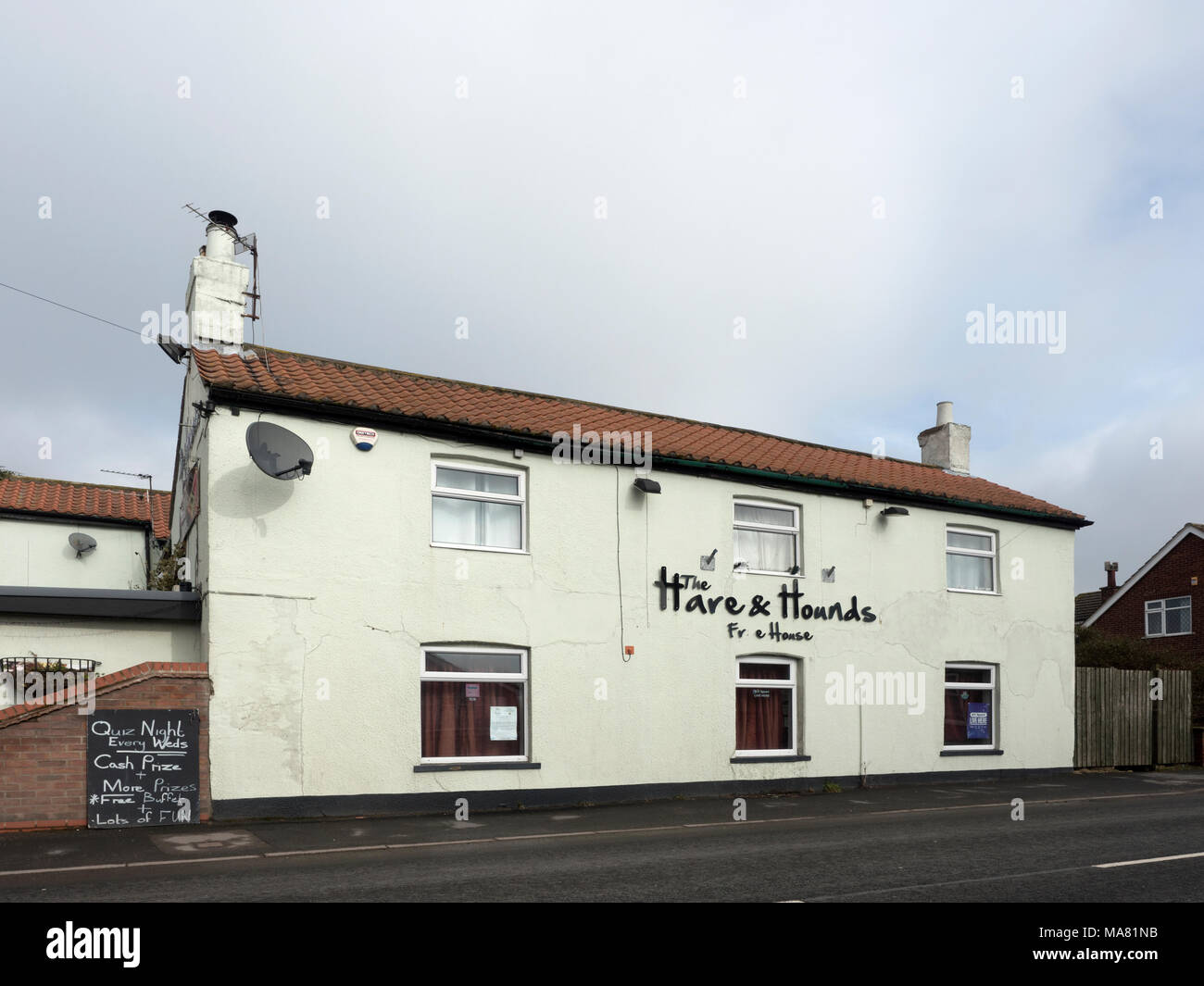 Hare and Hounds public house, High Street, Holme on Spalding Moor, East Riding of Yorkshire, England, United Kingdom Stock Photo