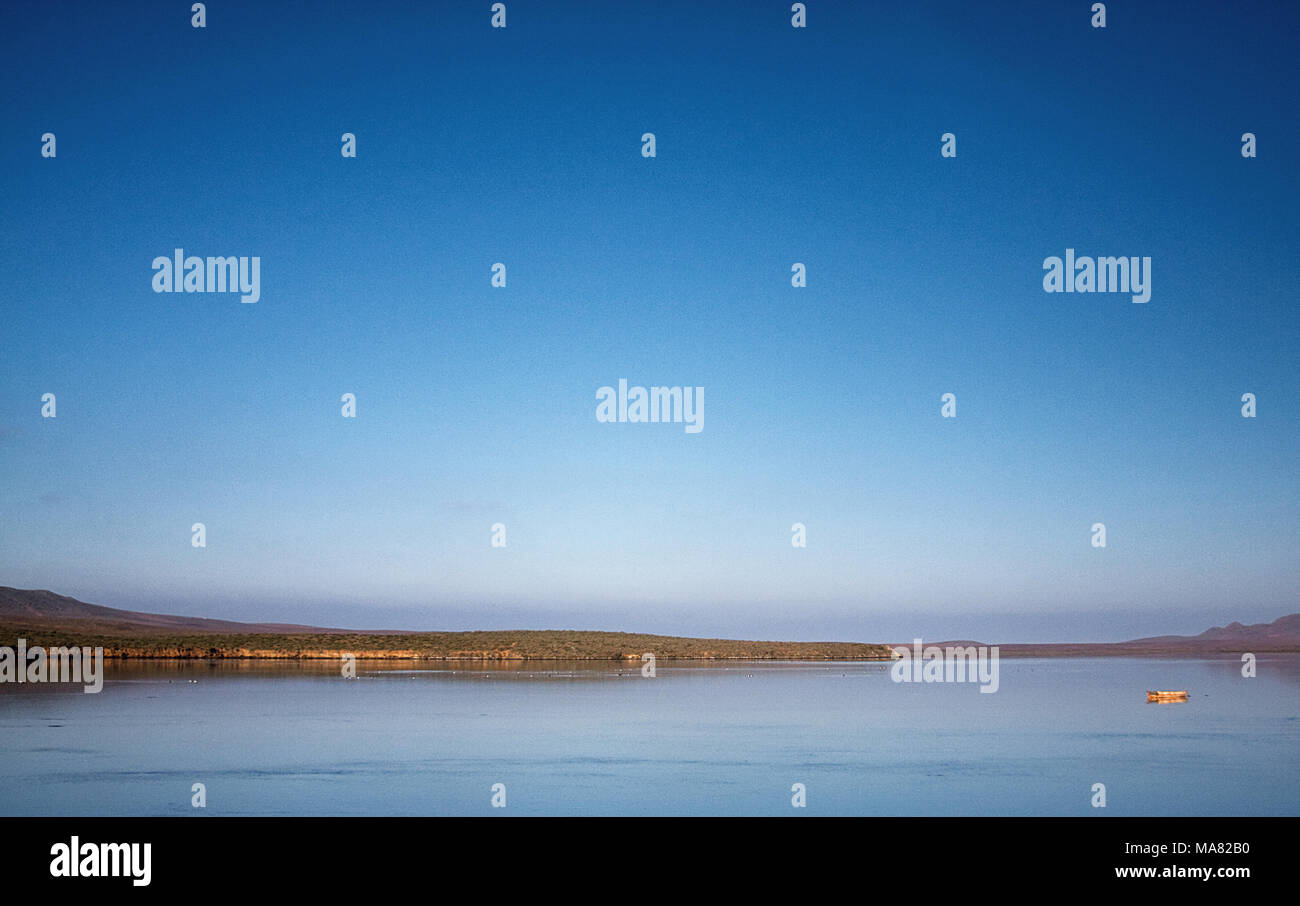 Fishing boat between the rocks hi-res stock photography and images - Alamy