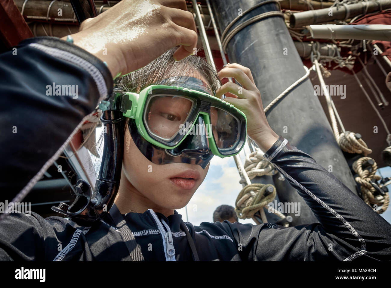 Snorkeling mask. Young girl wearing a diving face mask and snorkel