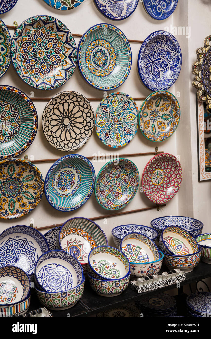Morocco, Fes, Quartier des Potiers, Pottery showroom, traditionally decorated plates shop display Stock Photo