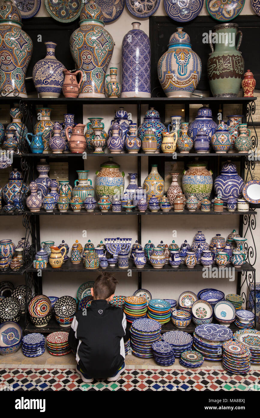 Morocco, Fes, Quartier des Potiers, Pottery showroom, colourfully decorated pots shop display Stock Photo