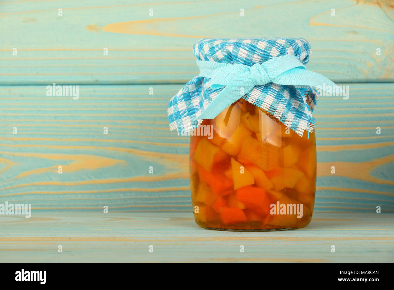Close Up Of One Glass Jar Of Homemade Quince Jam With
