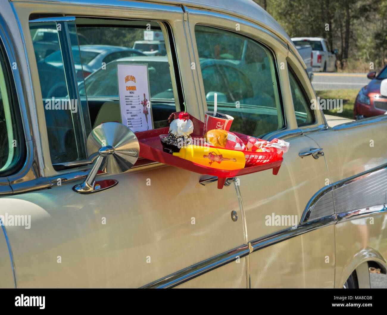 Car Show in Ft. White, Florida. Car Hop Tray in window of a 1957 Chevrolet classic car. Stock Photo