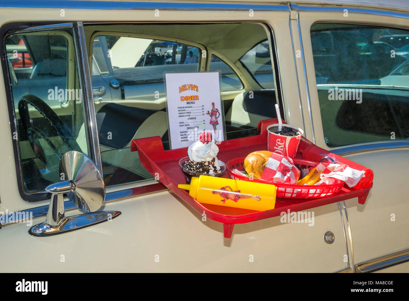 Car Show in Ft. White, Florida. Car Hop Tray in window of a 1957 Chevrolet classic car. Stock Photo