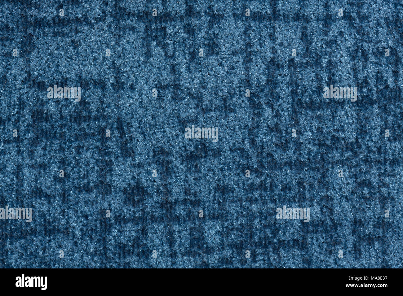 Strict textile background in blue colour. Stock Photo