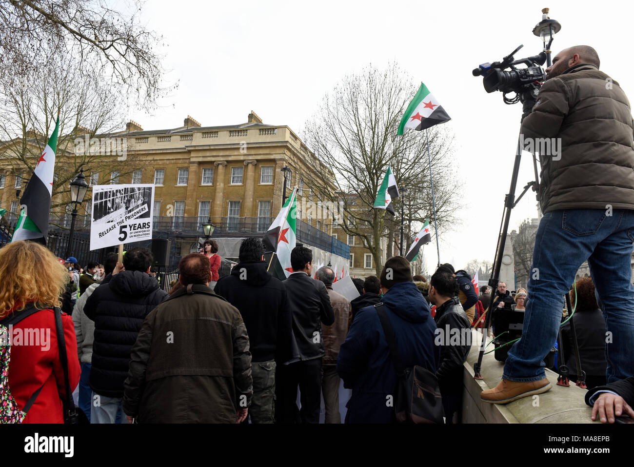 People gathered to protest against Assad regime during the 5th Anniversary of the Syrian Revolution, London, UK. Stock Photo