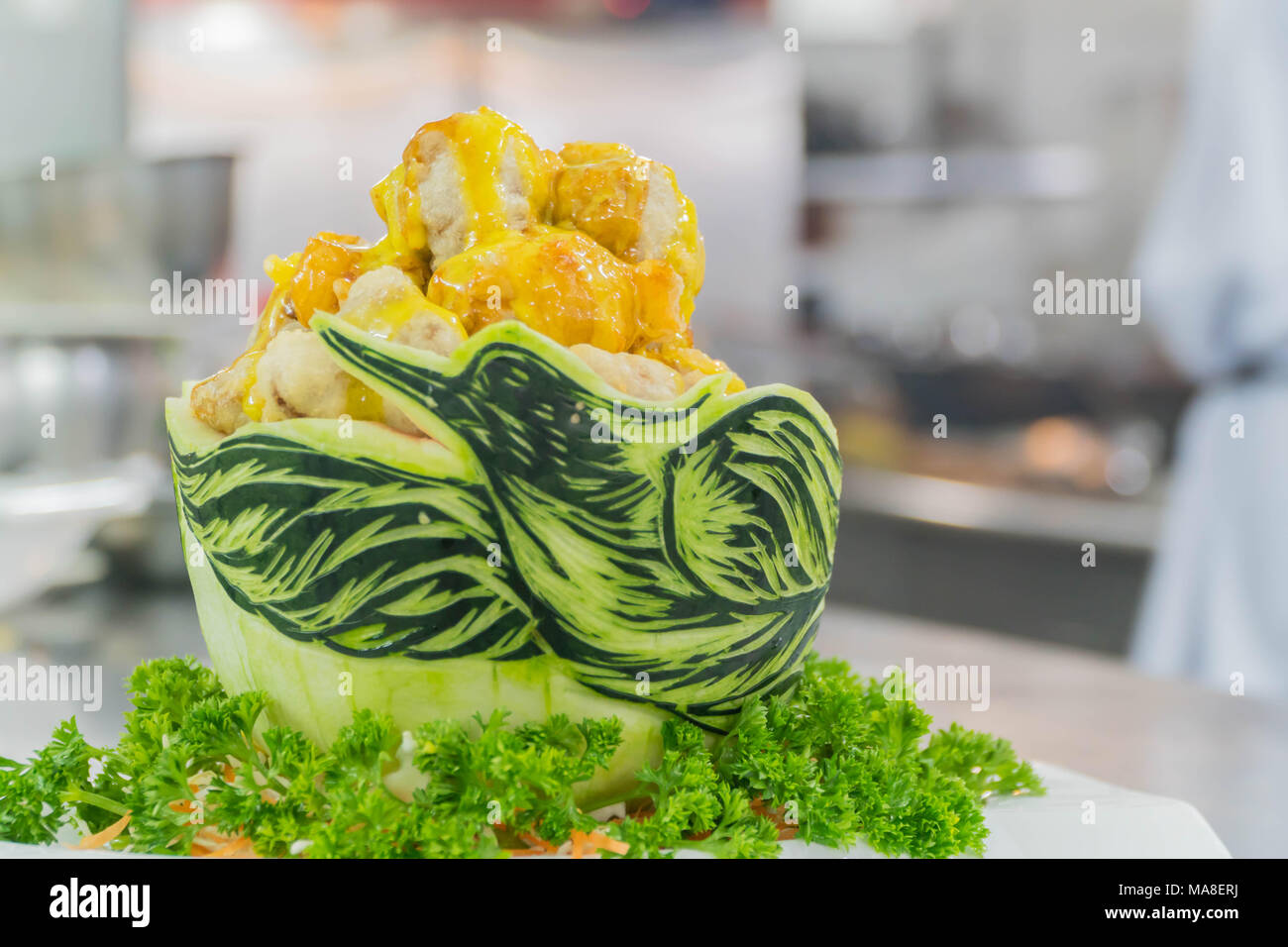 Fried chicken in watermelon Carving swan. Stock Photo