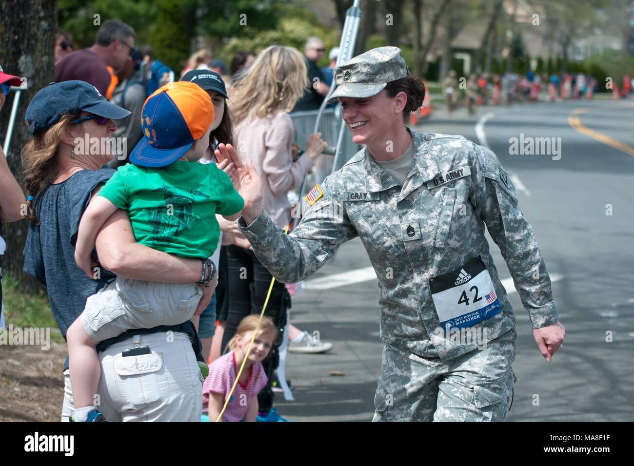 Dozens of Soldiers and Airmen of the Massachusetts National Guard marched the entire route of the 121st Boston Marathon, April 17, 2017. () Stock Photo