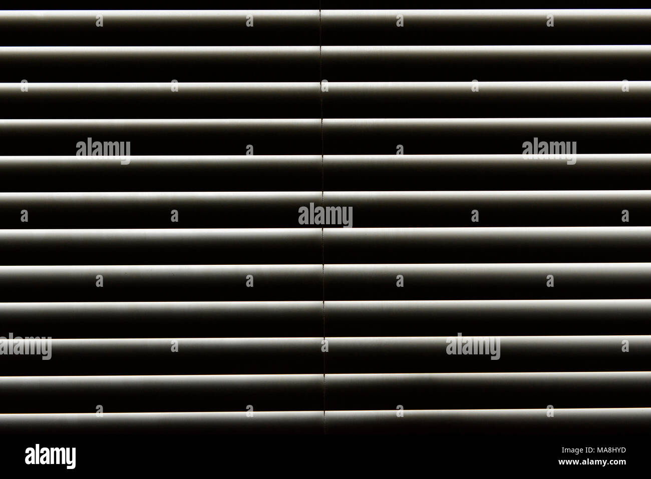 A Venetian blind seen against the light Stock Photo - Alamy