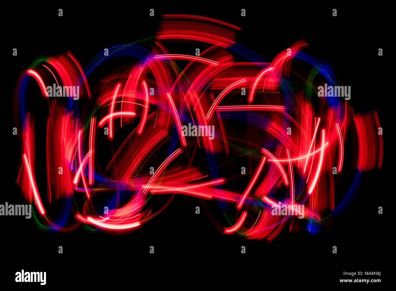 Red color abstract light painting. LED lights on black background Stock ...