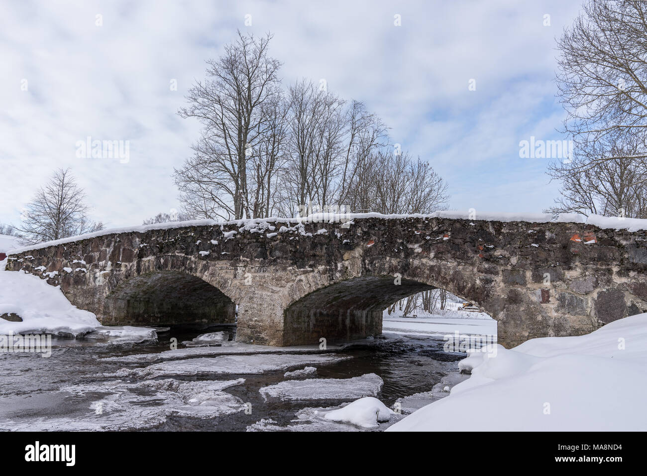 Old stone bridge over frozen hi-res stock photography and images - Alamy