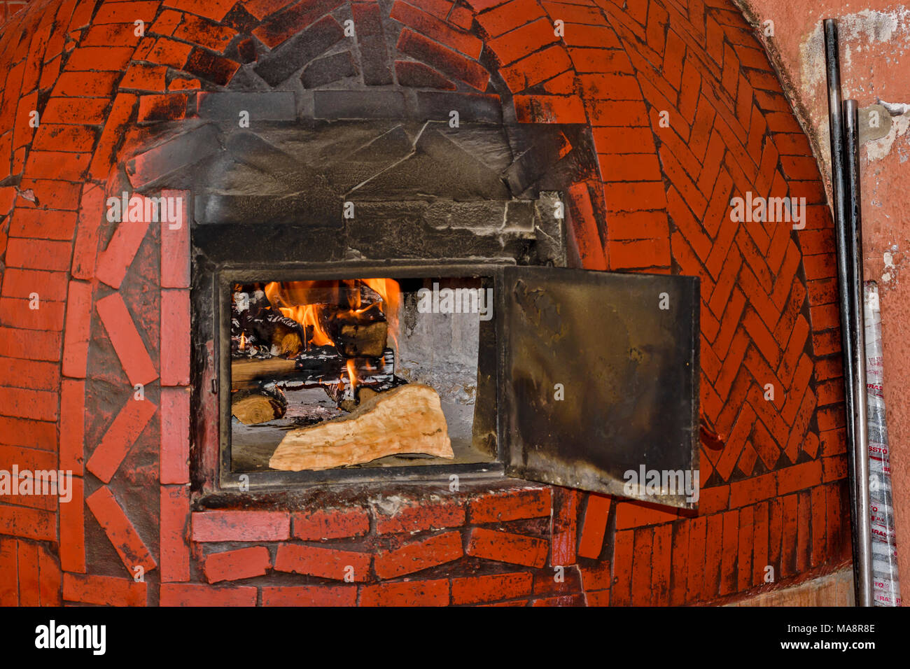 MOROCCO MARRAKECH PLACE JEMAA EL FNA WOOD FIRE INSIDE A PIZZA OVEN Stock Photo