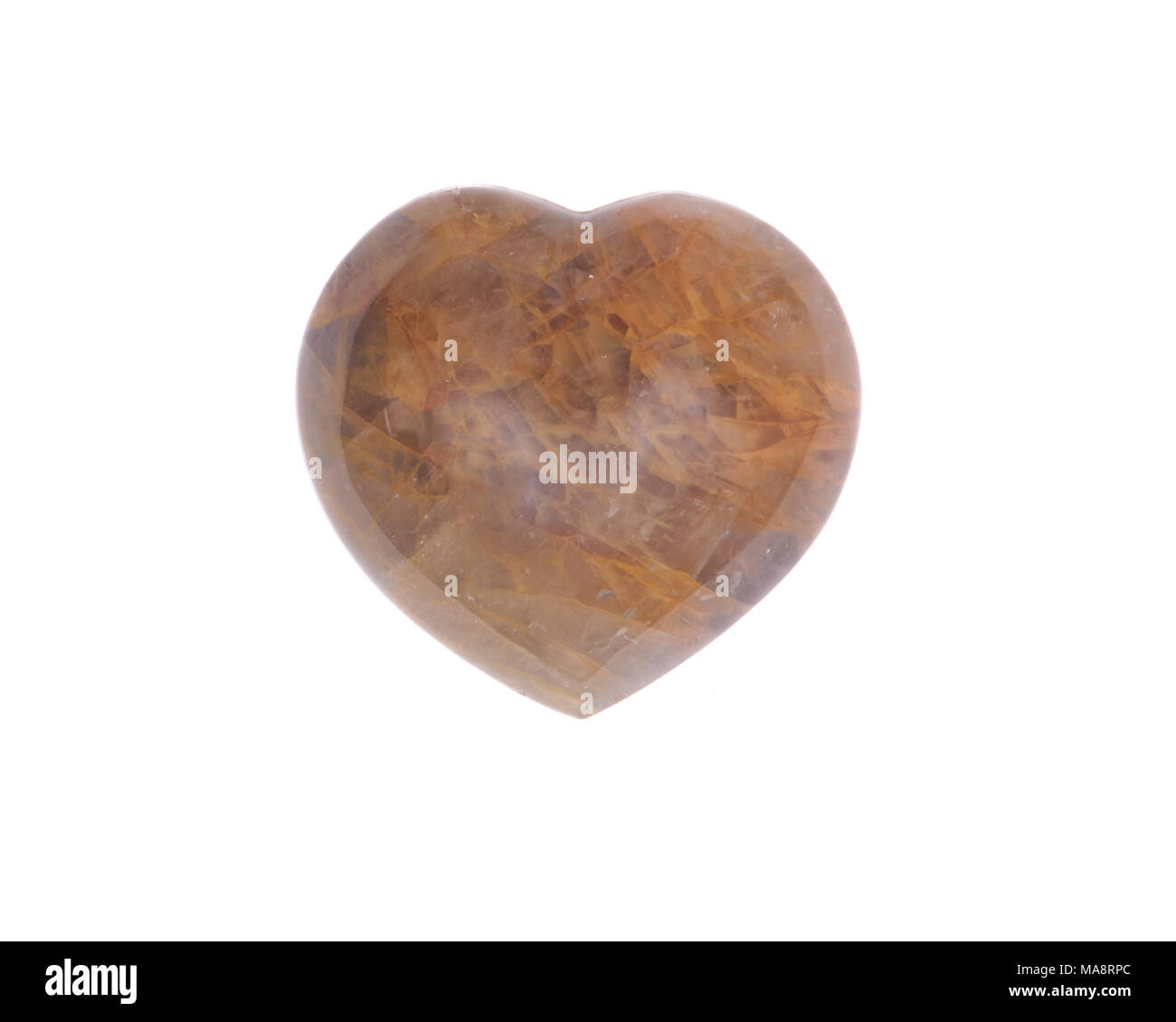 Golden healer quartz heart isolated on white background Stock Photo - Alamy