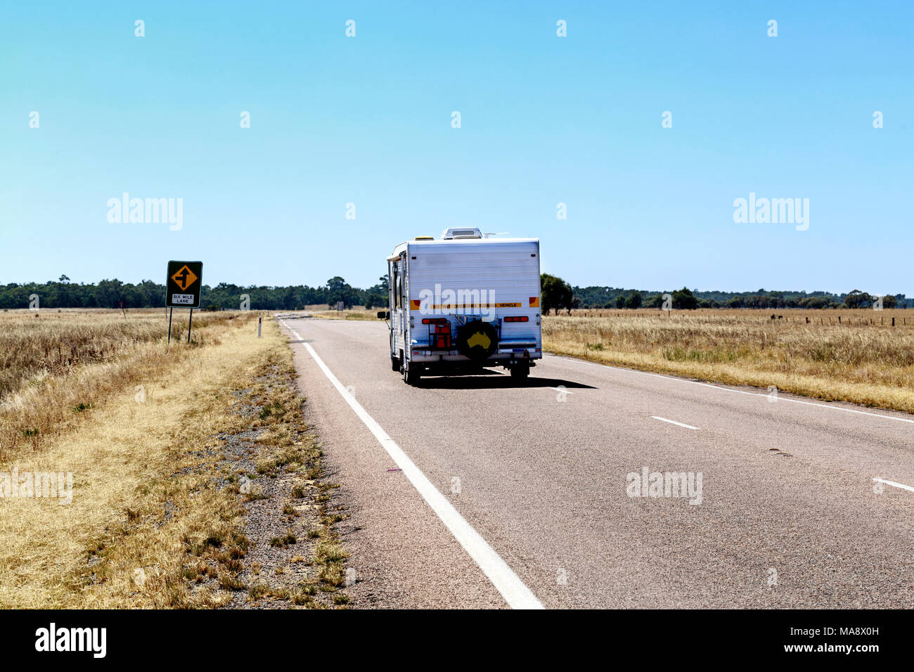Common view on the Australian roads. Grey nomad: A retired person who travels independently within their own country, particularly in a caravan or mot Stock Photo