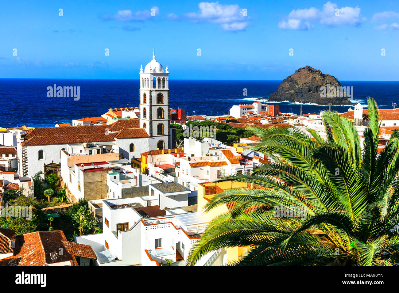 Traditional Garachico village,view with church,houses and rock,Tenerife island,Spain. Stock Photo