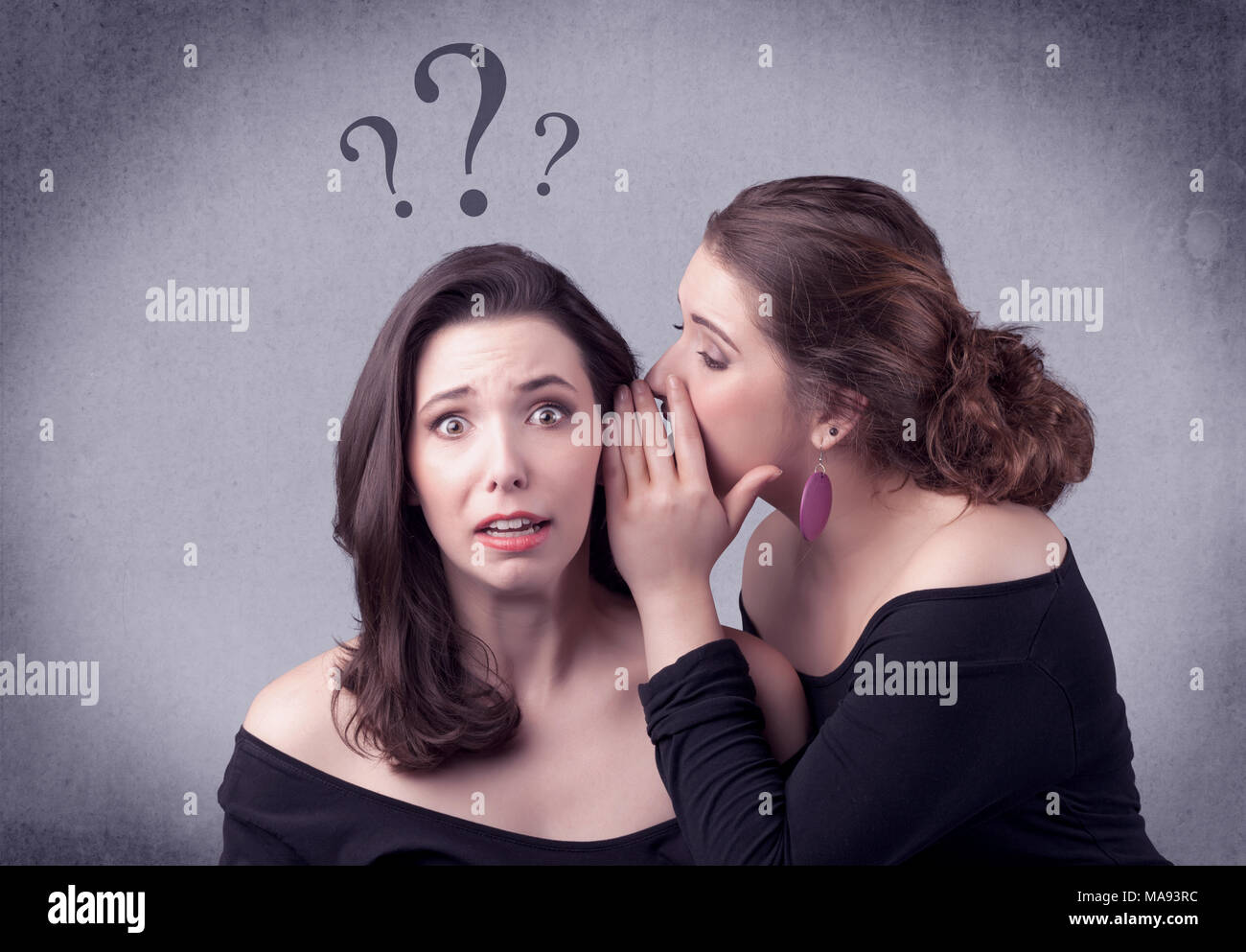 A teenager girl looking confused with drawn question marks above the