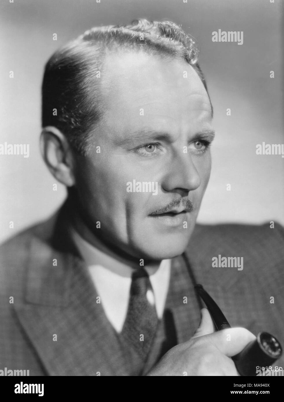 Charles Ruggles, Head and Shoulders Publicity Portrait with Pipe, Paramount Pictures, 1933 Stock Photo