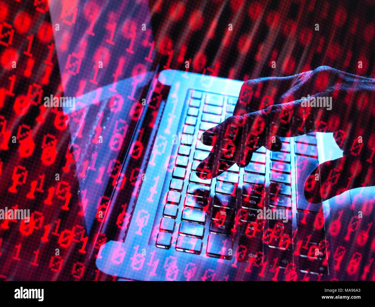 MODEL RELEASED. Cyber attack, conceptual image. Hacker accessing somebody else's computer programme. Stock Photo