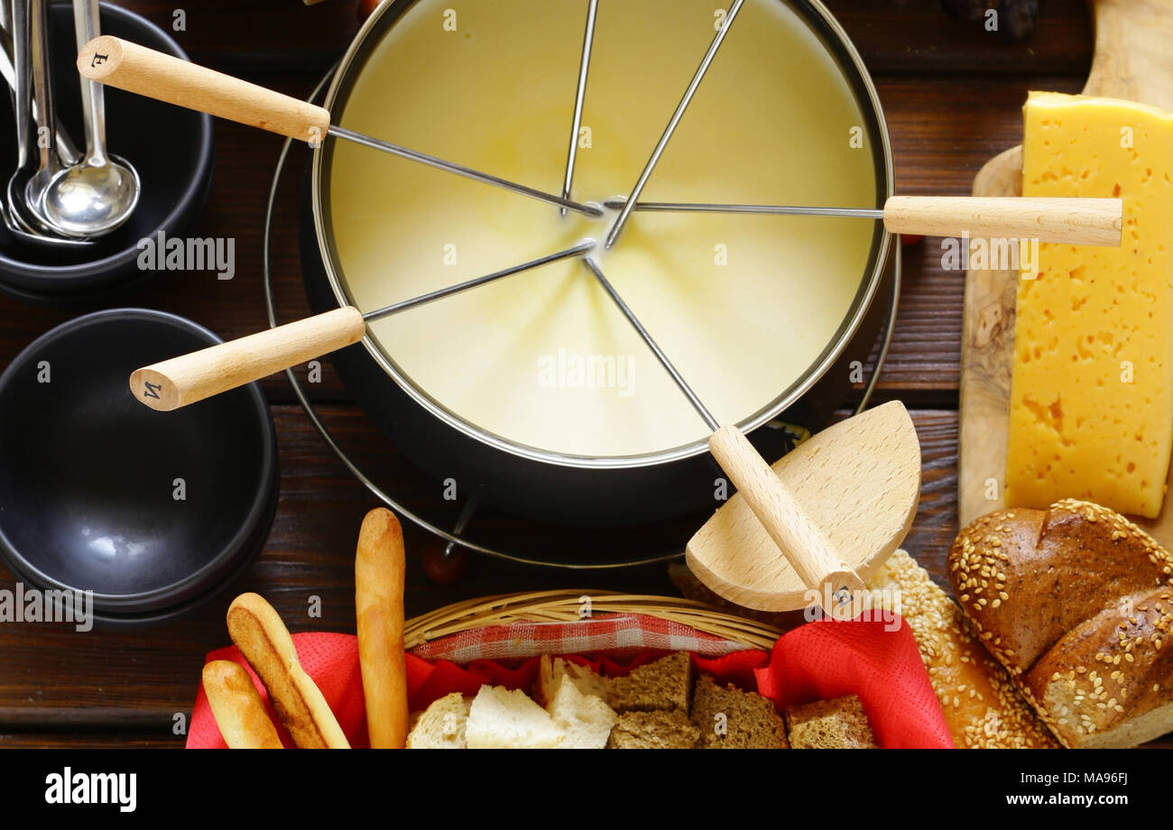 cheese fondue with bread in a special dish Stock Photo Alamy