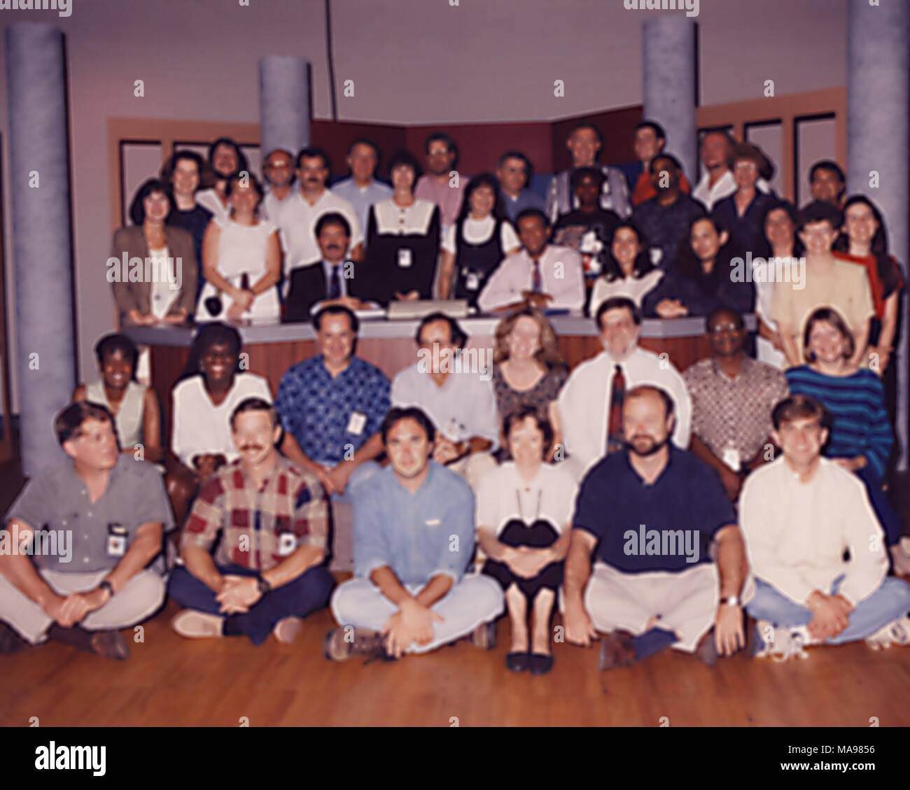 Dr William Atkinson instructor at the National Immunization Program and the broadcast moderator Joe Washington sitting amongst their colleagues, 1994. Image courtesy Centers for Disease Control (CDC). () Stock Photo