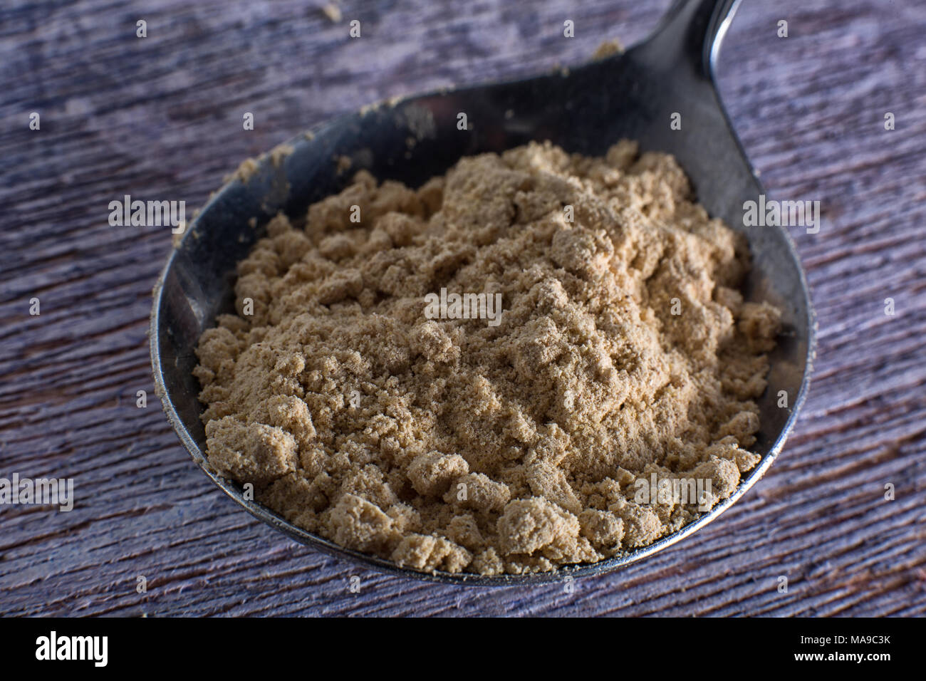 maca root powder in spoon Stock Photo