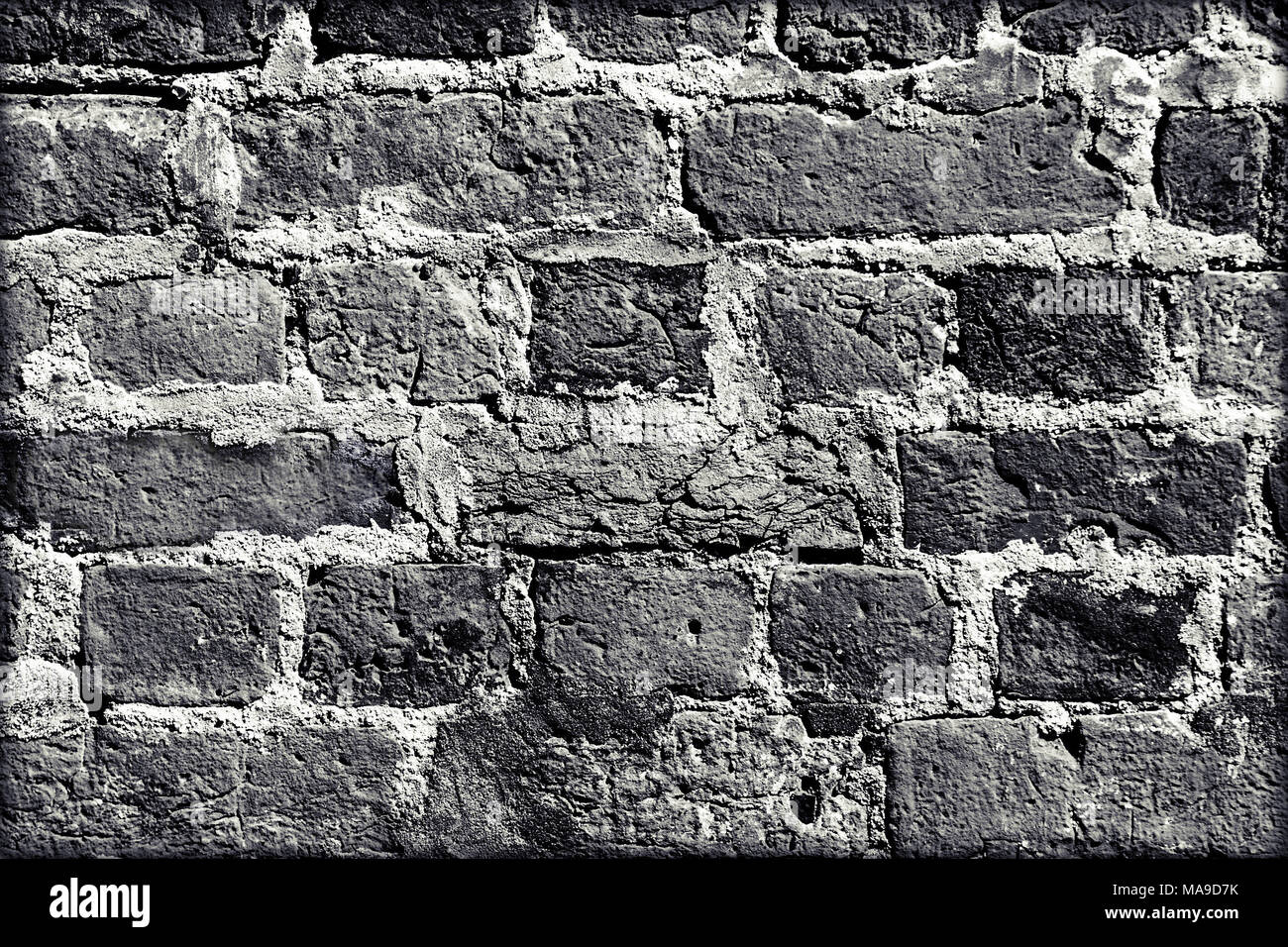 BLACK BRICK WALL TEXTURE. Brick wall black and white. Stock Photo