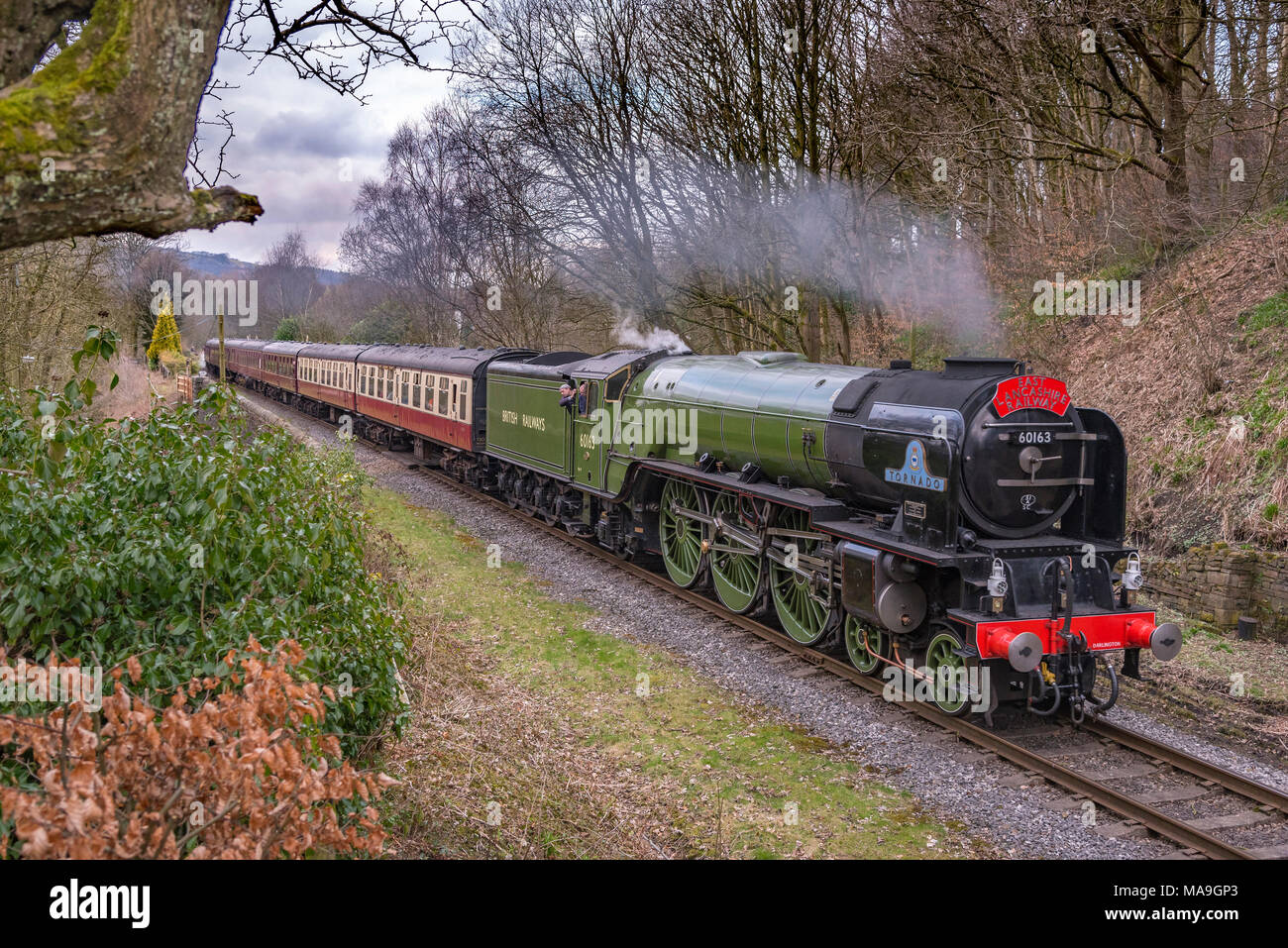 Summerseat, Bury.  United Kingdom.  30th. March 2018. Taking a break from steaming the main line at 100mph, Peppercorn class A1 Pacific locomotive 60163 Tornado takes and Easter break at a sedate 25mph on the East Lancashire heritage railway during their Easter Weeked. Tornado celebrates it's 10th birthday this year. Credit: John Davidson Photos/Alamy Live News Stock Photo