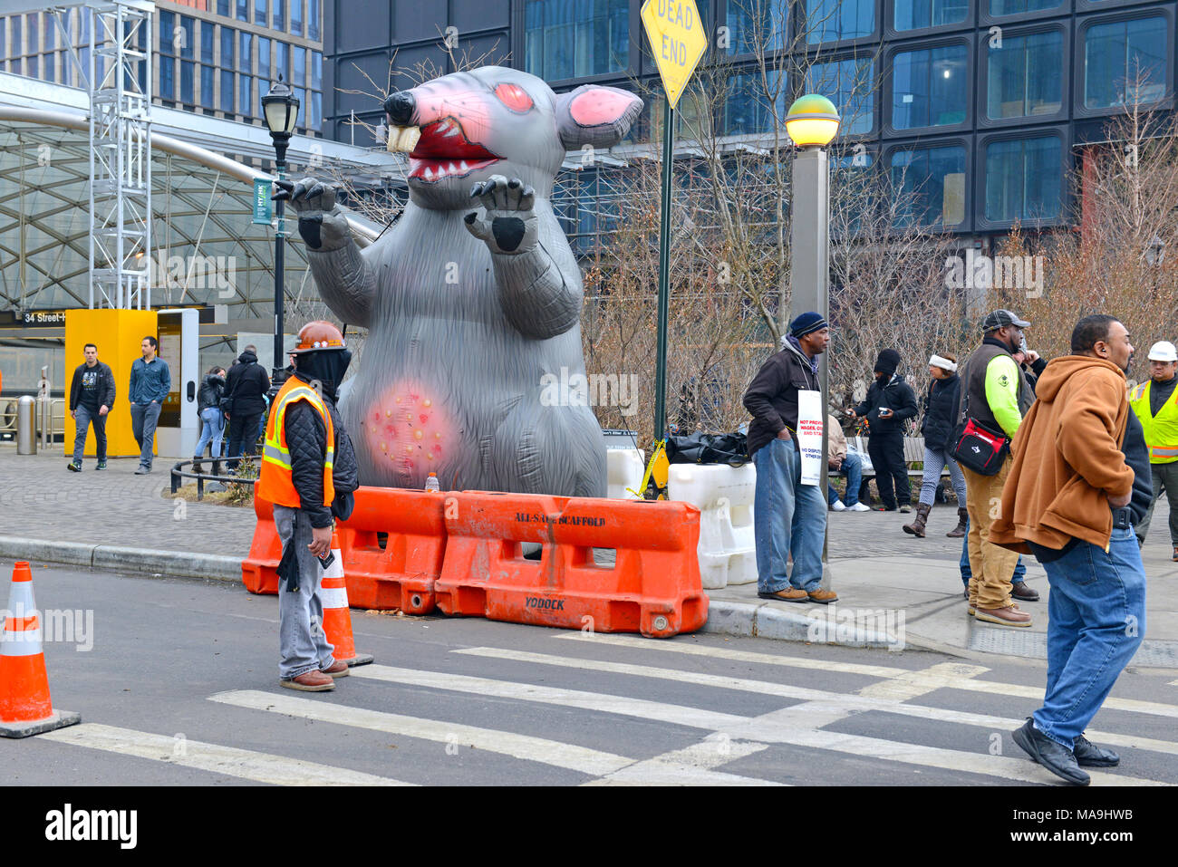 NEW YORK CIRCA MARCH 2018. Inflatable rat known as Scabby the Rat, being used by Labor Union workers to strike and protest working conditions and benefits in the west side of Manhattan by Hudson Yards Stock Photo