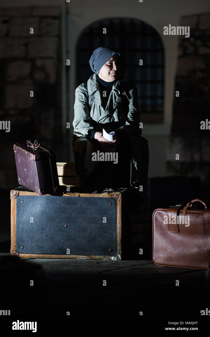 Krakow, Poland. 30th Mar, 2018. Polish actors seen during a performance against the raise of AntiSemitism in the Jewish quarter in Krakow. According to the organizers, the performance reminds the public of the dramatic events of March 1968 in Poland, when the Communist regime expeled thousands of Jews. The main task of the performance is to show the effects of anti-Semitic politics of nowadays, the realization that politicians have woken up cruel demons in the nation again - lack of tolerance, xenophobia, fear of strangers. Credit: Omar Marques/SOPA Images/ZUMA Wire/Alamy Live News Stock Photo