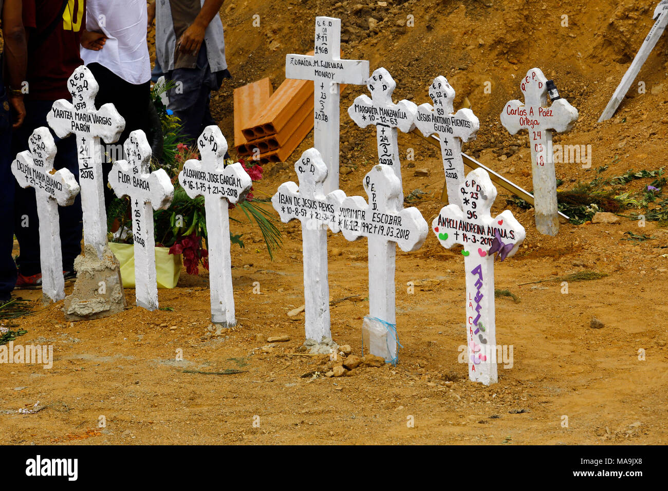Valencia, Carabobo, Venezuela. 30th Mar, 2018. Relatives denounce that the  government ordered to place different dates to the crosses in the tombs, to  hide the true amount of deaths, in the motin