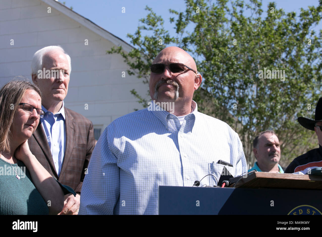 Pastor Frank Pomeroy of First Baptist Church of Sutherland Springs, TX, introduces U.S. Sen. John Cornyn, whose Fix NICS Act was signed into law March 23. A gunman killed 26 congregation members during service at FBC in November 2017. Stock Photo