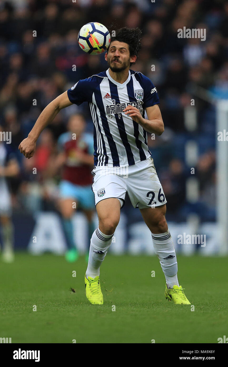 West Bromwich , UK, 31 Mar 2018. West Bromwich , UK, 31 Mar 2018.Ahmed Hegazy of West Bromwich Albion tries to control the ball. Premier League match, West Bromwich Albion v Burnley at the Hawthorns Stadium in West Bromwich on Saturday 31st March 2018. This image may only be used for Editorial purposes. Editorial use only, license required for commercial use. No use in betting, games or a single club/league/player publications. Pic by Paul Roberts/Andrew Orchard sports photography/Alamy Live news Stock Photo