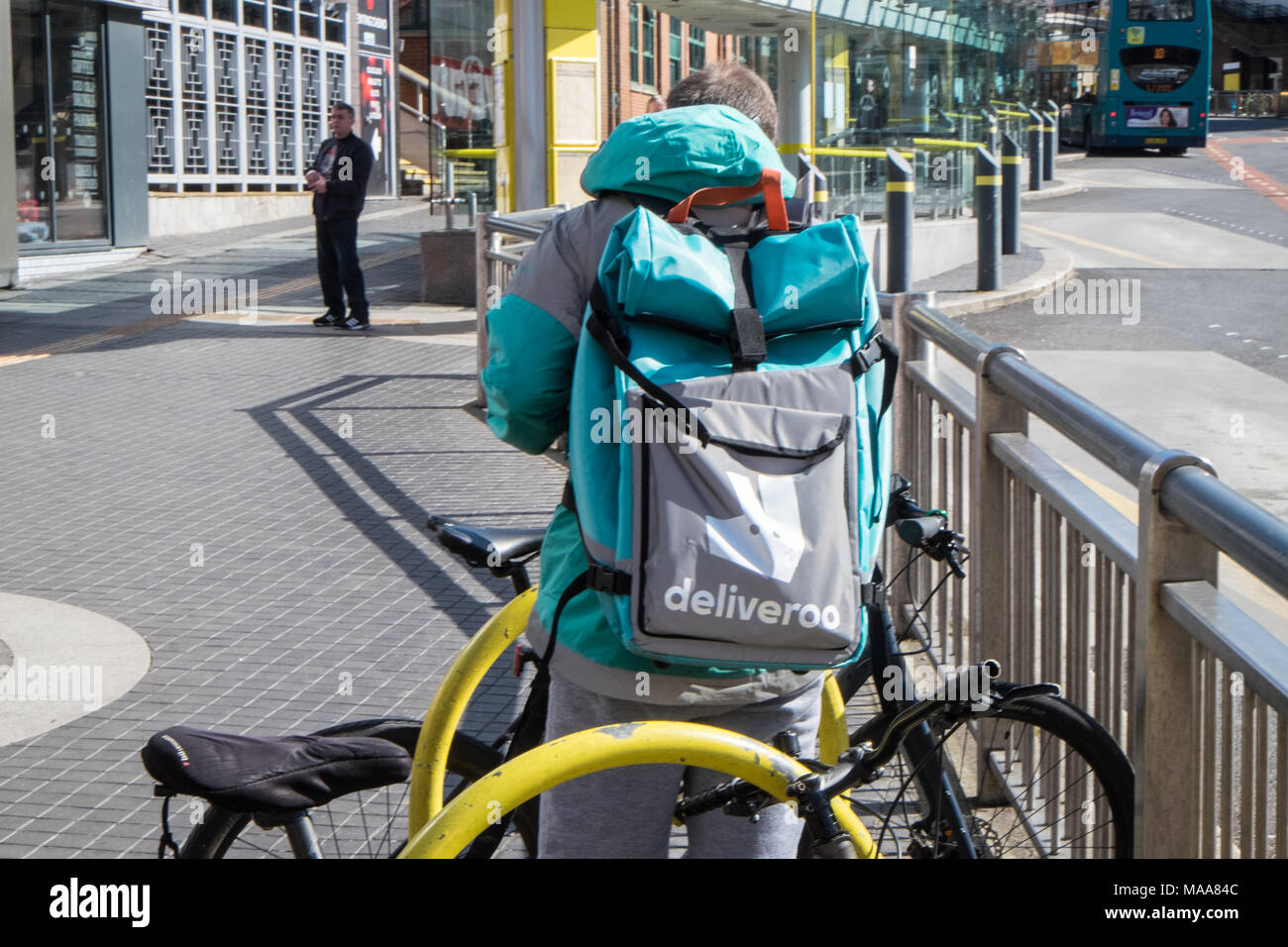 Deliveroo ,cyclist,outside,food,outlet,Liverpool,Merseyside,England,English,UK,U.K.,Britain,Great Britain,GB,Europe, Stock Photo