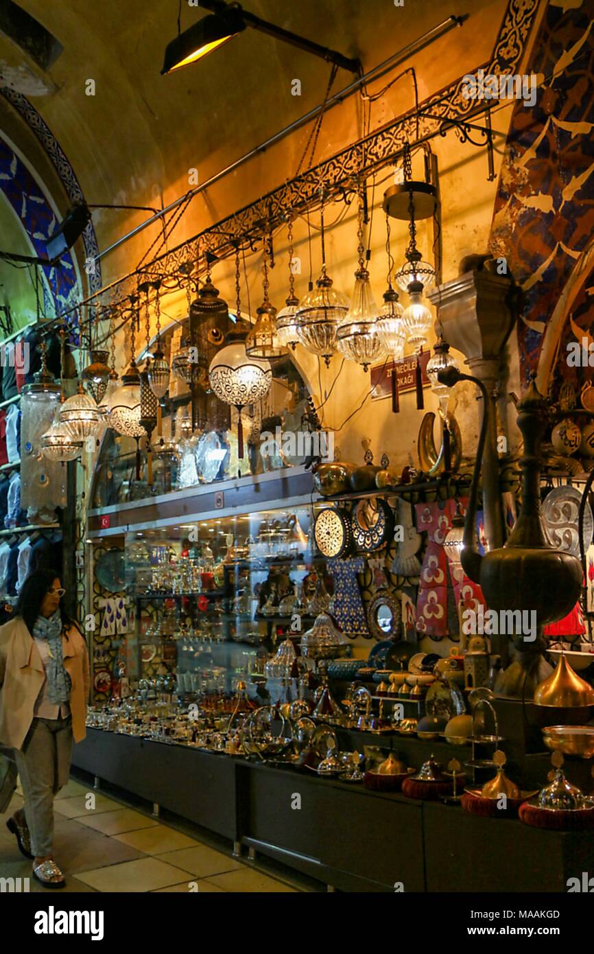 Tourist looking around at the shop window filled with the antiques, Grand Bazaar (Kapalicarsi
